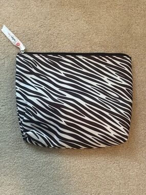 zebra pattern, several items,travel bags